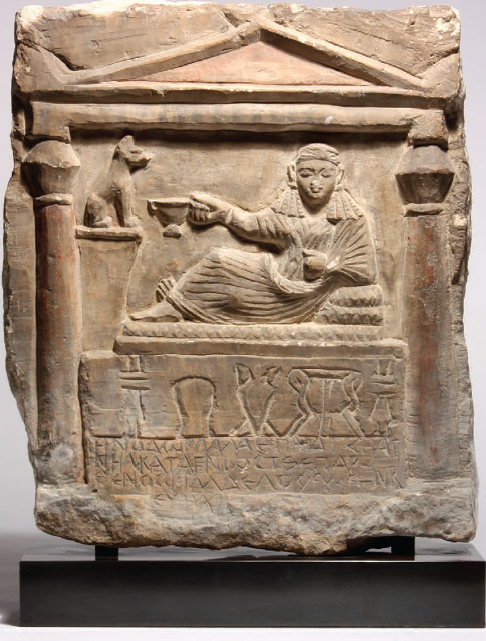 Fig. 1. Funerary Stele of Heliodora. Egyptian, 2nd–3rd century, limestone with traces of pigment, H: 43.40 cm, W: 38.00 cm. University of Missouri, Museum of Art and Archaeology (2011.25) Weinberg Fund and Gilbreath- McLorn Museum Fund