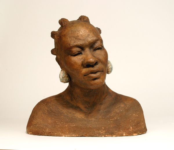 a painted terracotta bust sculpture