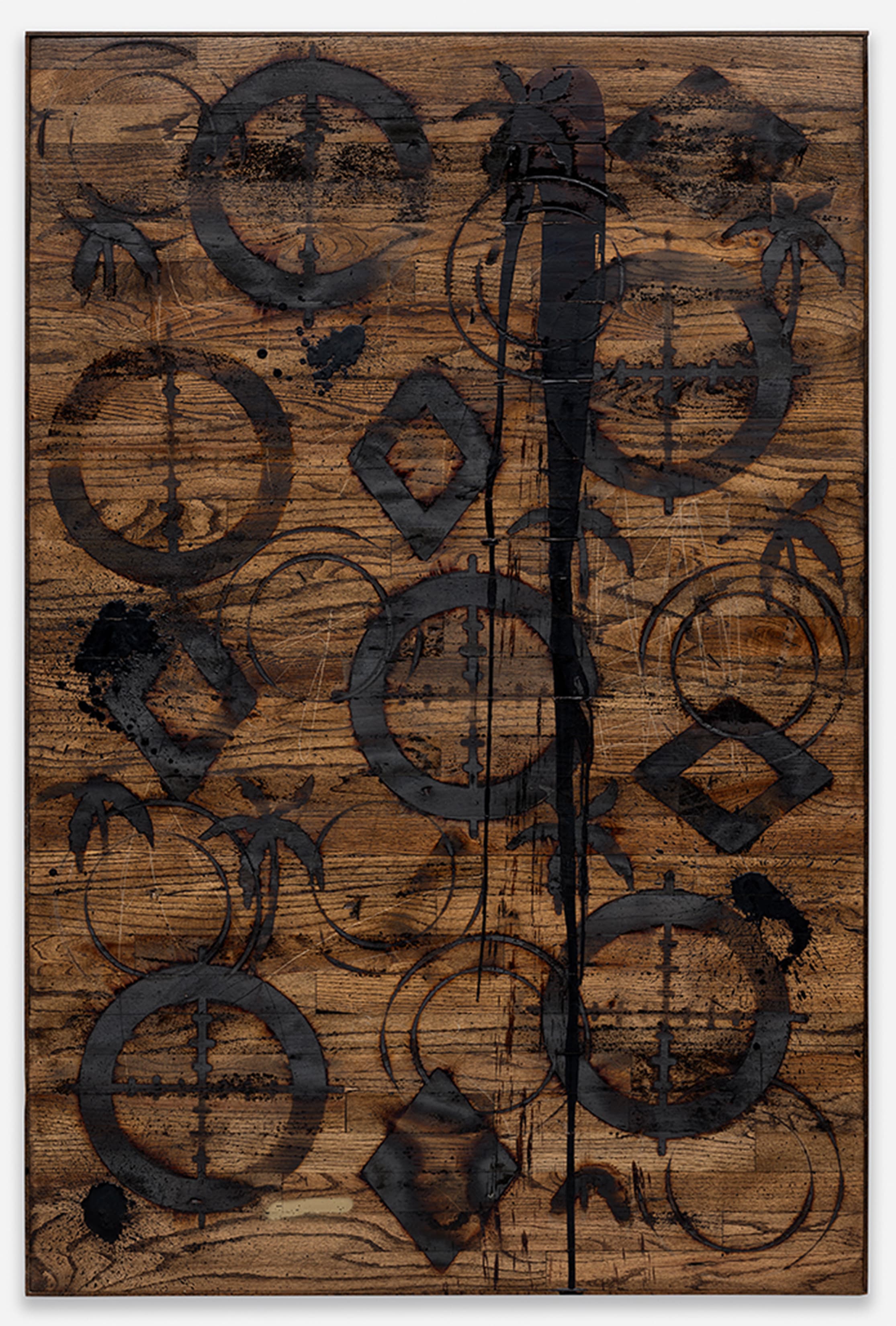 branded red oak flooring with black soap, wax, enamel spray