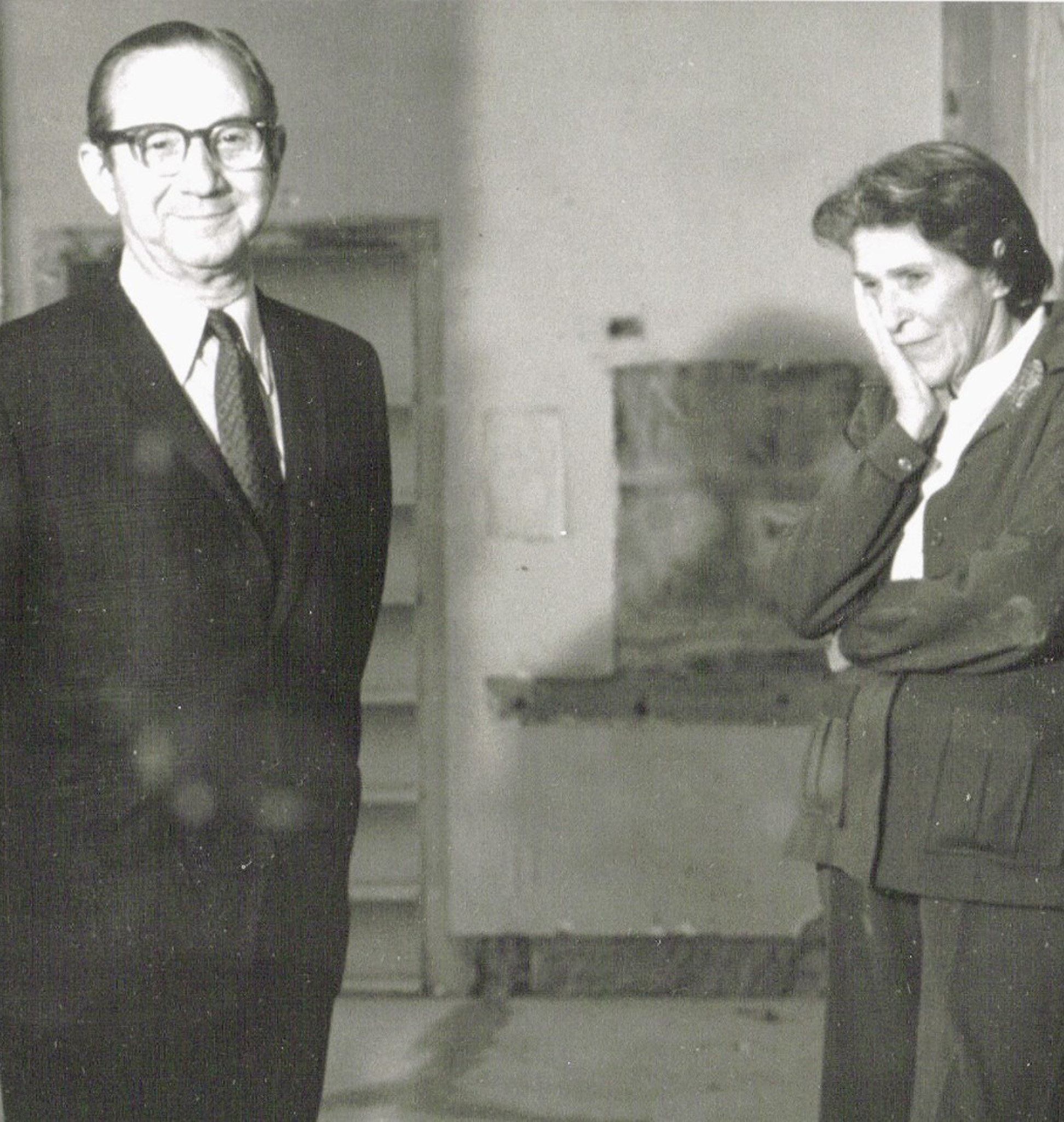 A photo of Saul and Gladys Weinberg in Pickard Hall, ca. 1975, during renovations of the building to serve as the Museum of Art and Archaeology